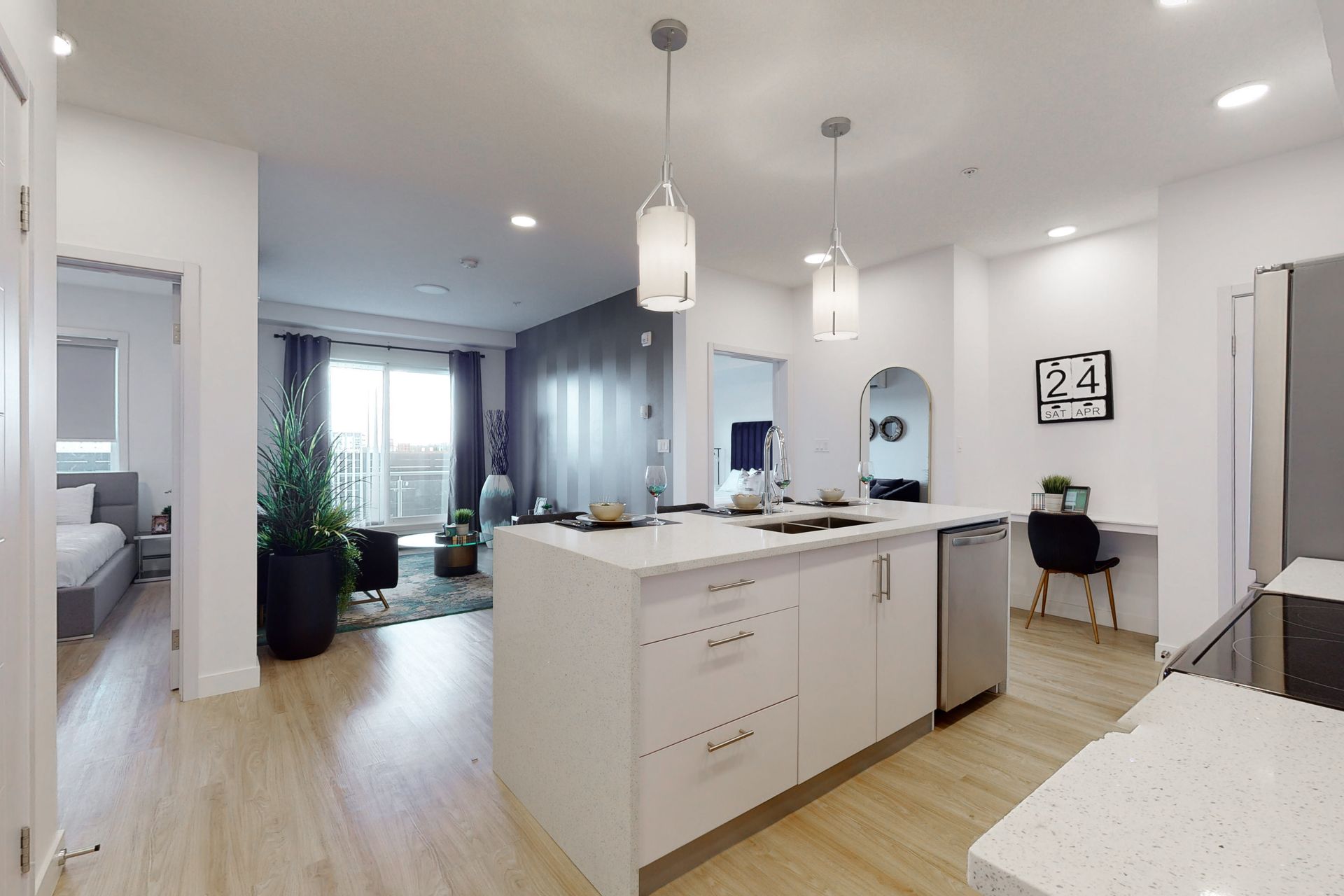A kitchen with a large island in the middle of the room.