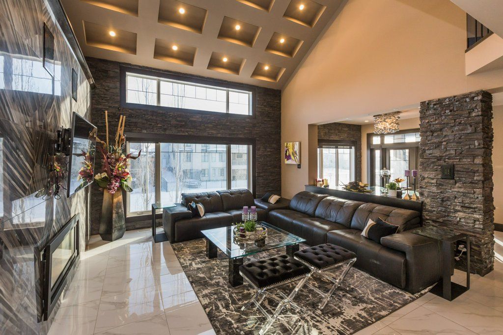 A living room filled with furniture and a fireplace.