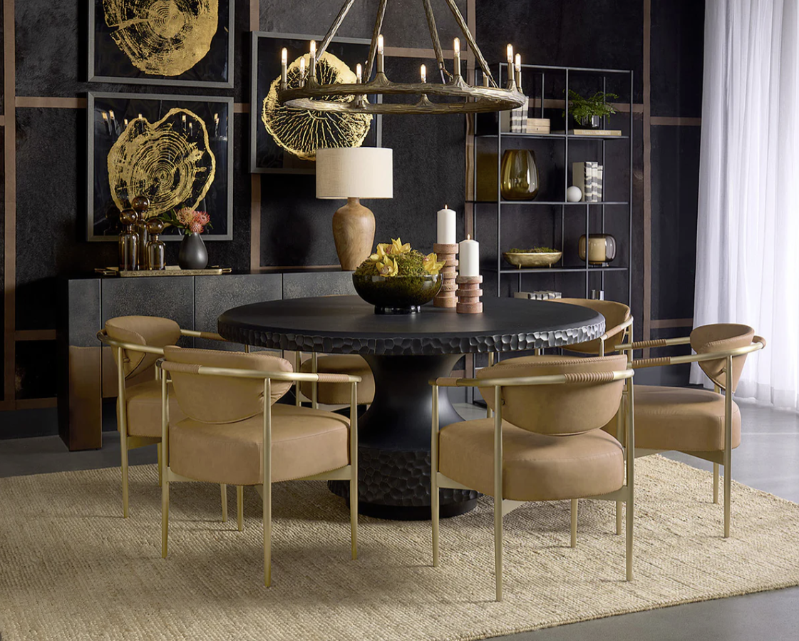 A dining room with a table and chairs and a chandelier