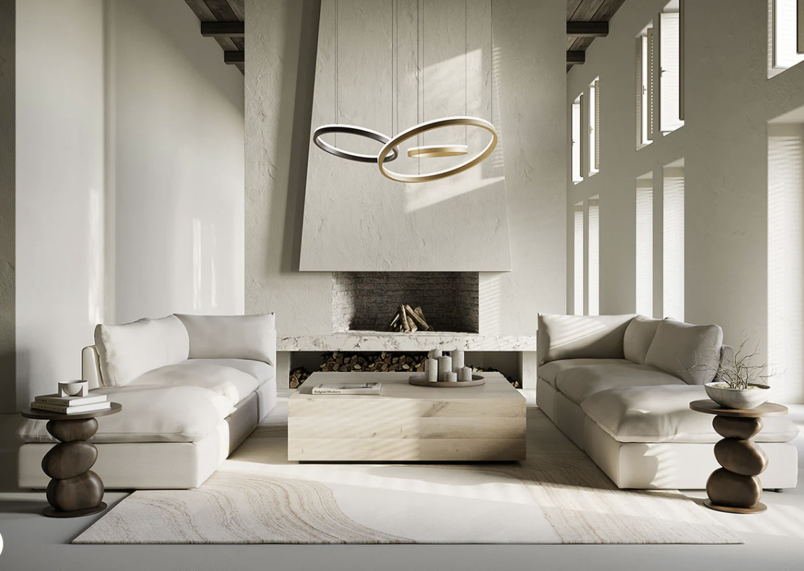 A living room with white furniture and a fireplace.