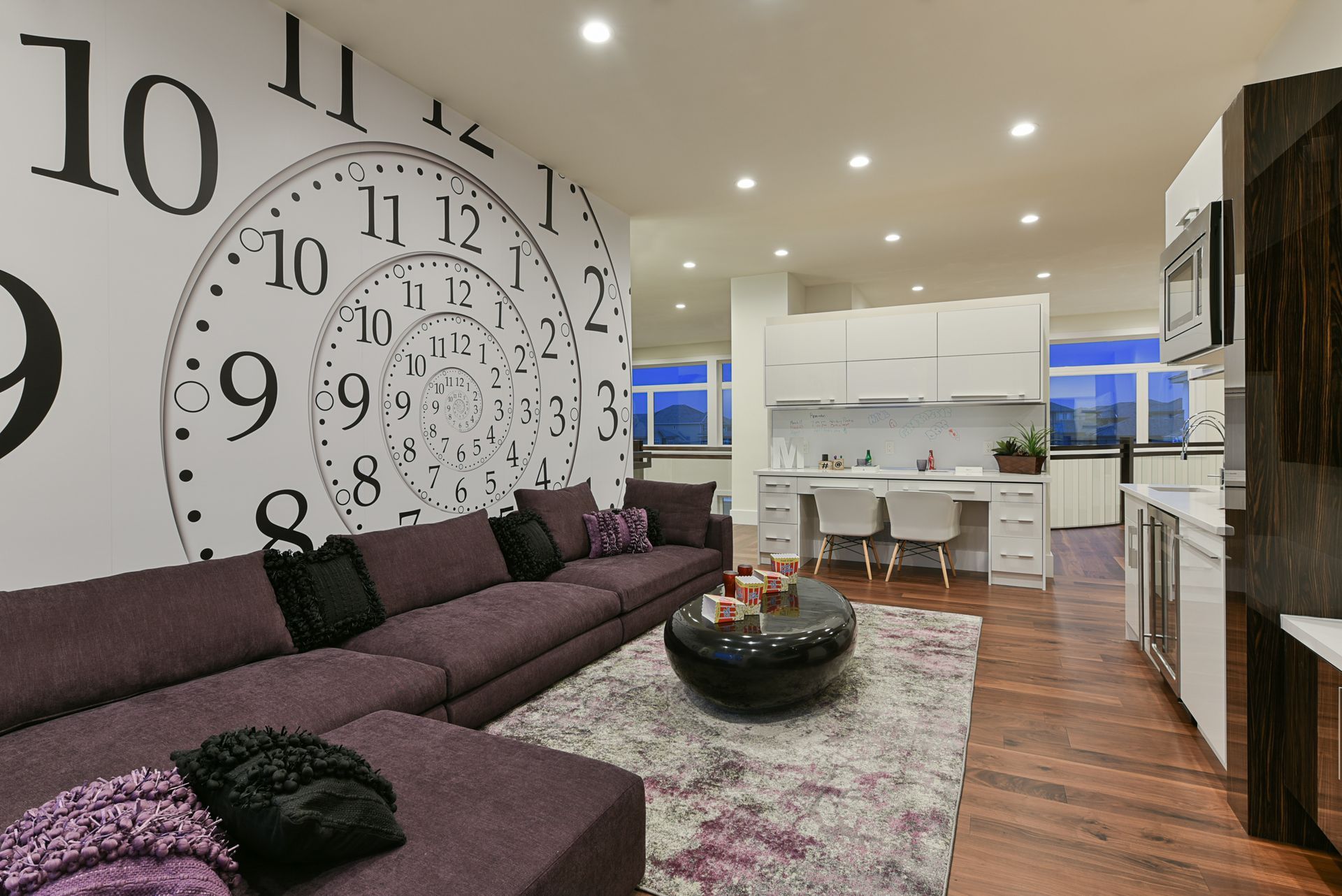 A living room with a large clock on the wall
