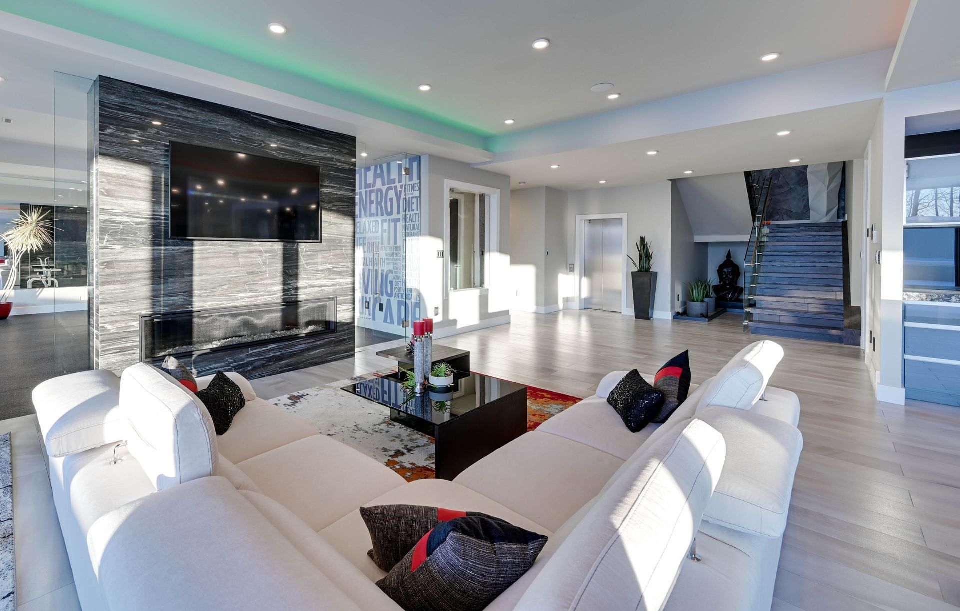A living room with a couch and a television