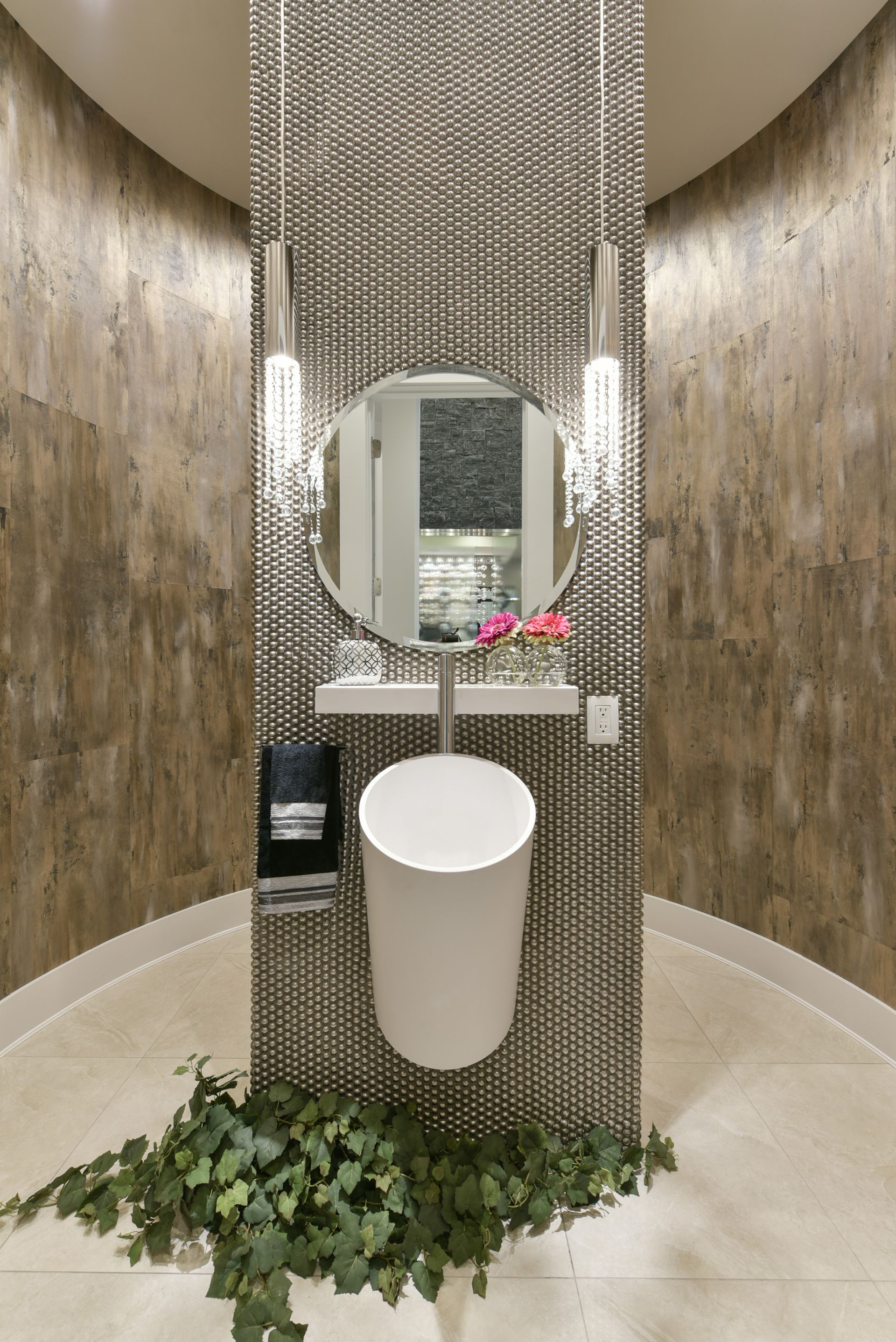 A bathroom with a sink and a mirror on the wall.