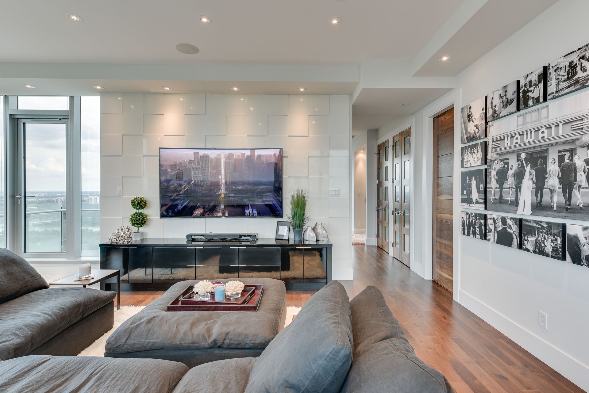 A living room with a couch and a flat screen tv