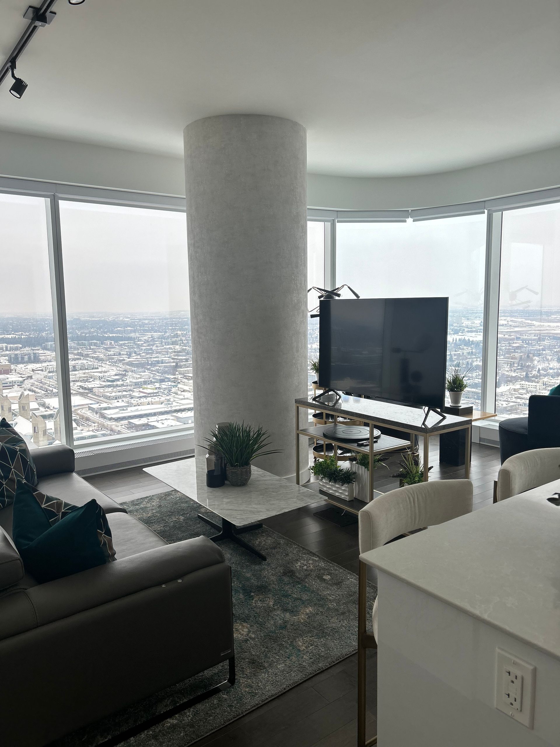 A living room filled with furniture and a flat screen tv.