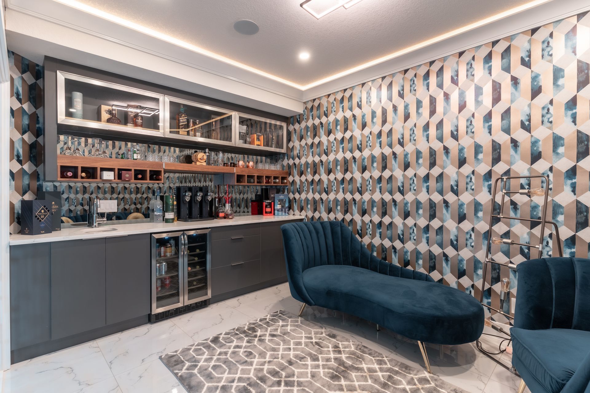 A living room with a couch , chairs , and a refrigerator.