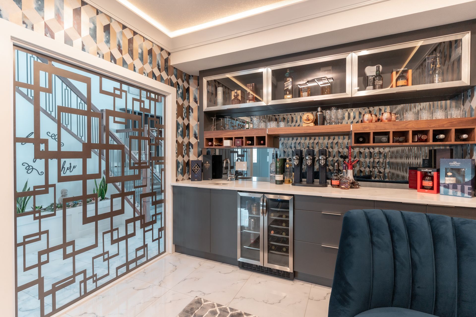 A living room with a bar and a couch.