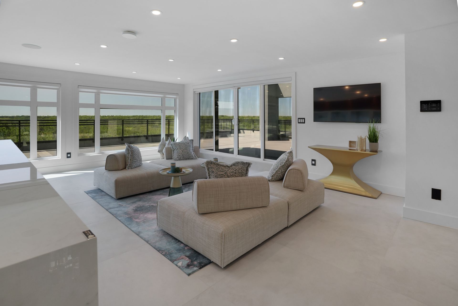 A living room filled with furniture and a flat screen tv.
