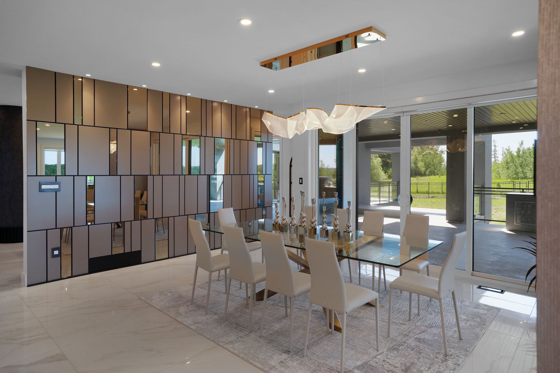 A dining room with a large table and chairs