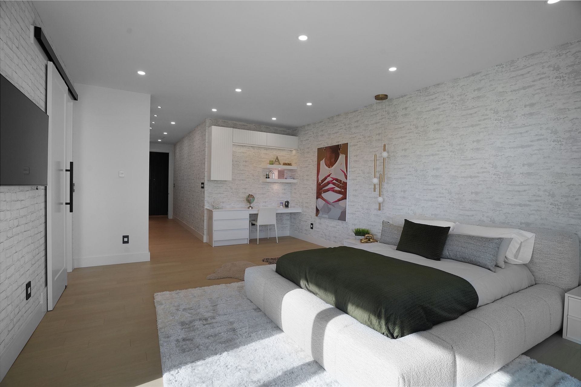 There is a large bed in the middle of the room.