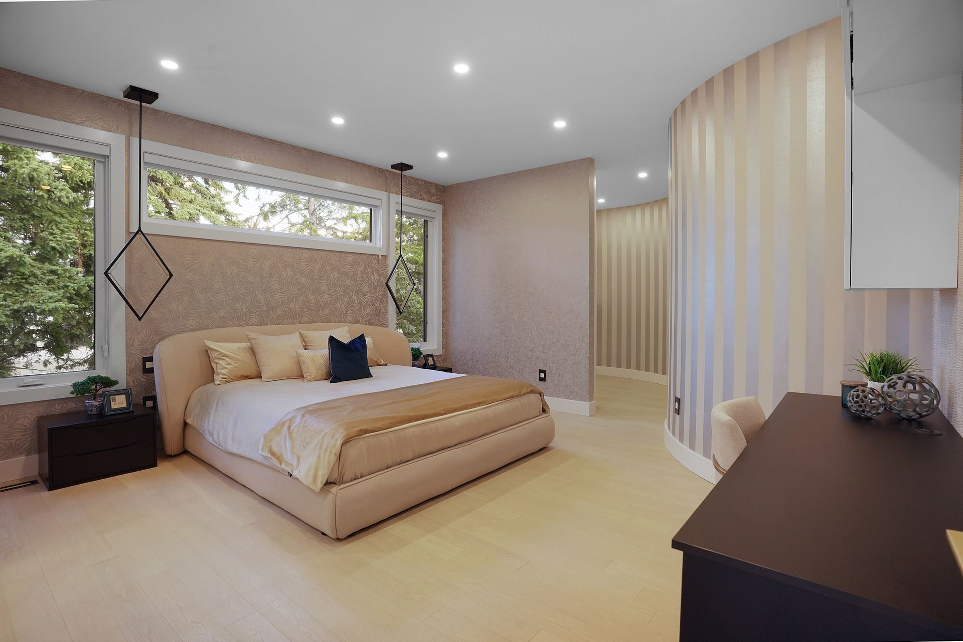 There is a large bed in the middle of the room.