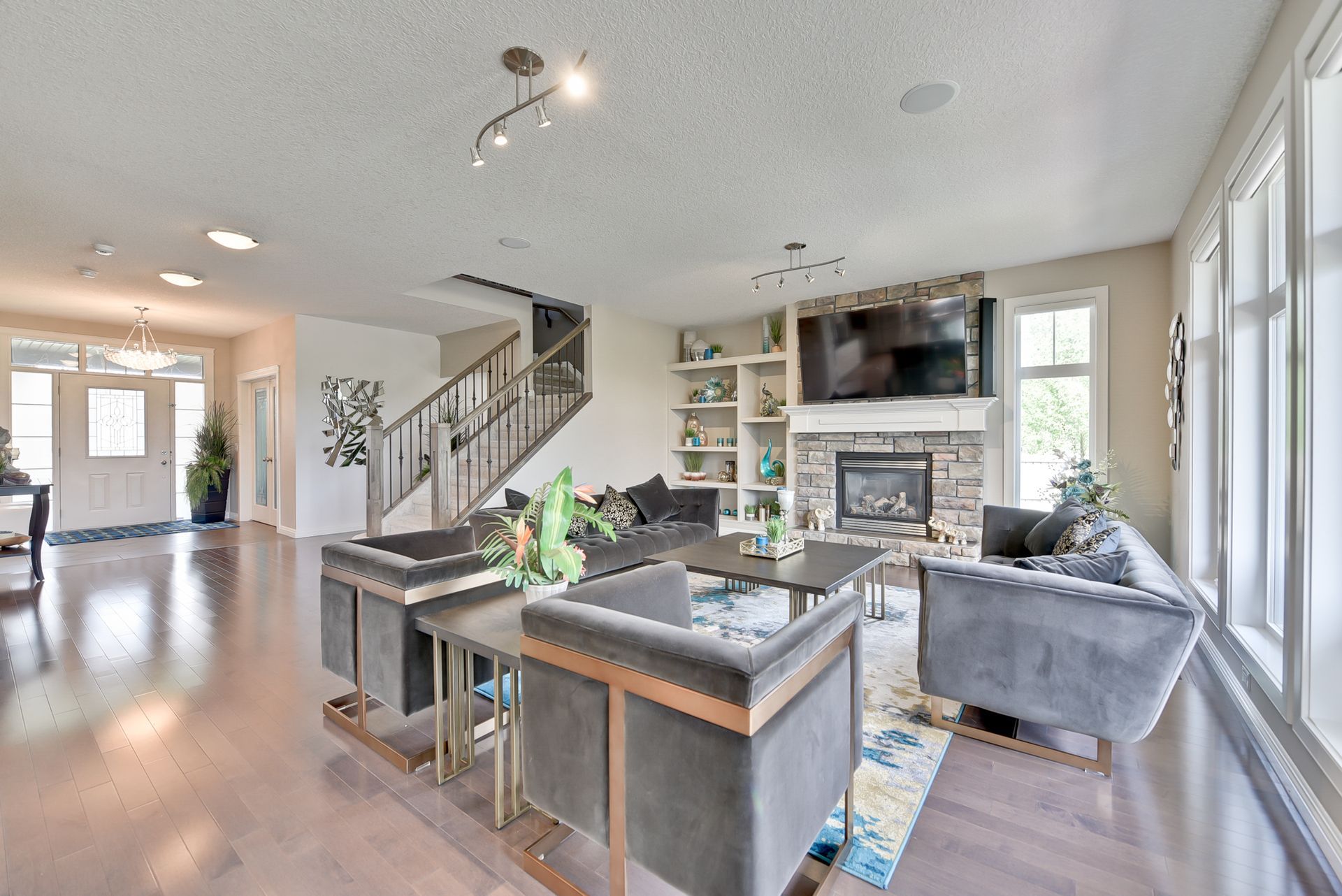 A living room filled with furniture and a fireplace.