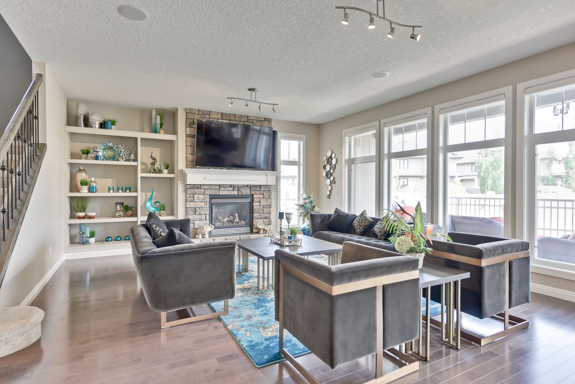 A living room filled with furniture and a fireplace.