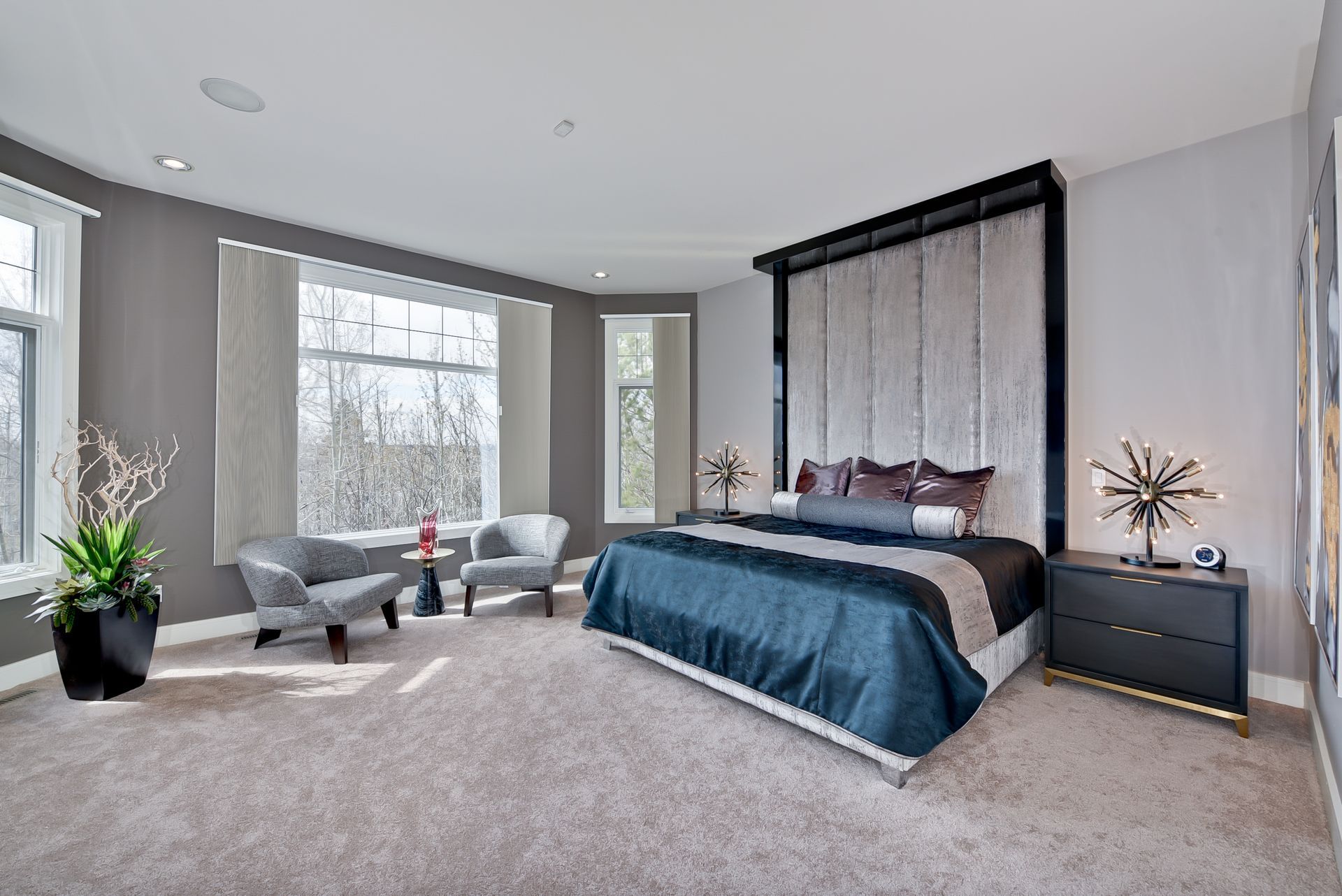 There is a large bed in the middle of the room.