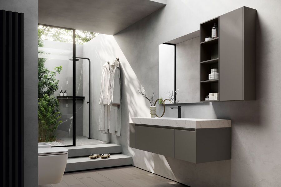 Un bagno con lavandino, WC e doccia.