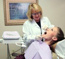 Woman Being Treated – Dental Practice in Whittier, CA
