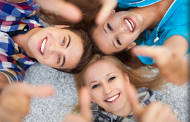 People Lying Down and Smiling – General Dentistry in Whittier, CA