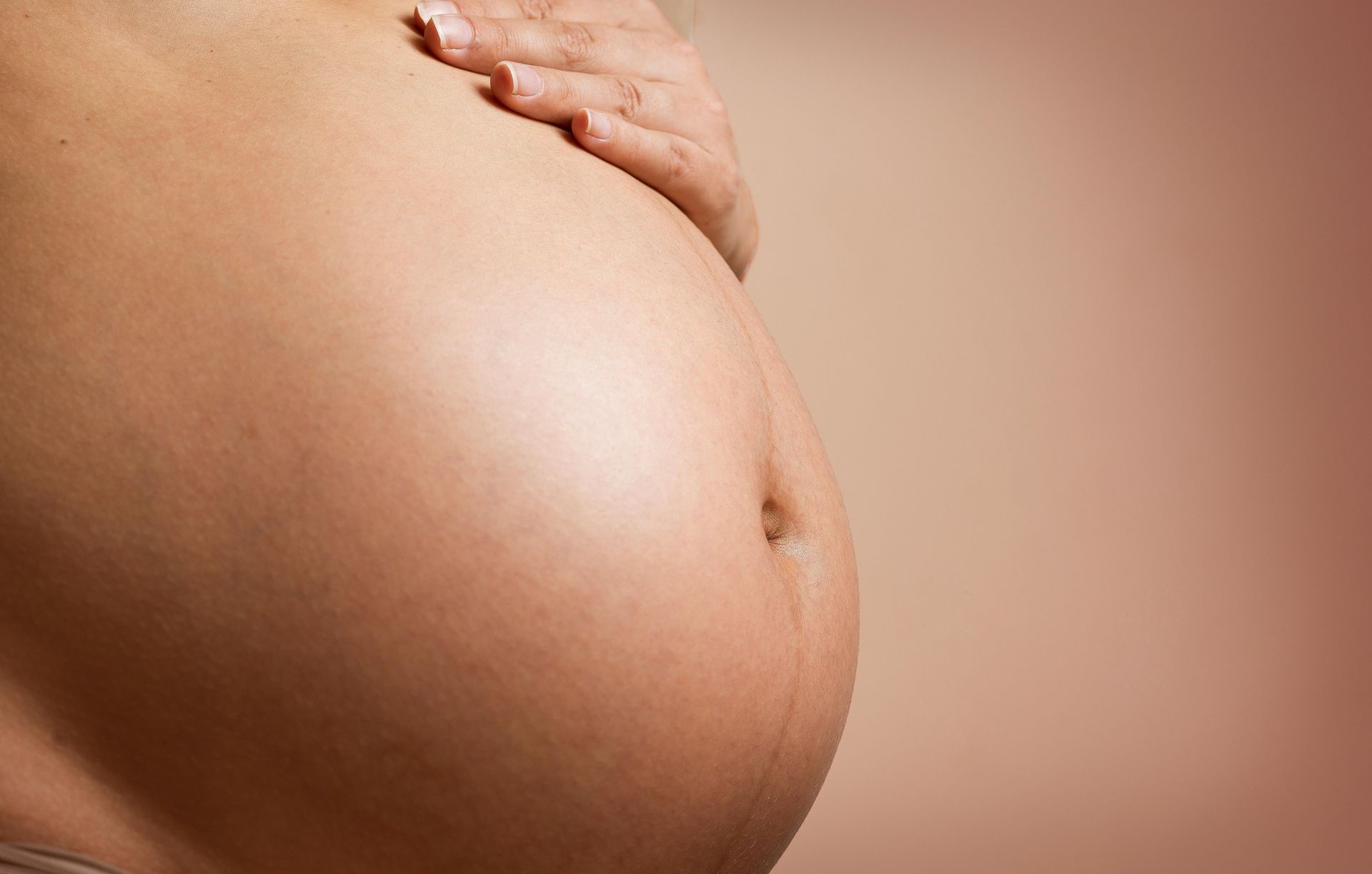 Pregnant woman with undiagnosed endometriosis.