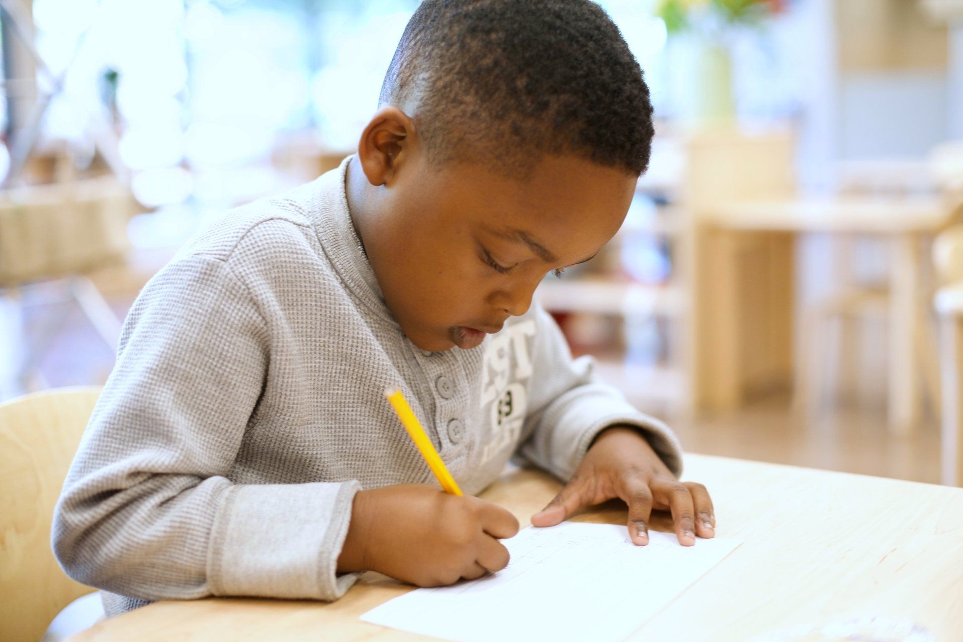 Montessori child writing