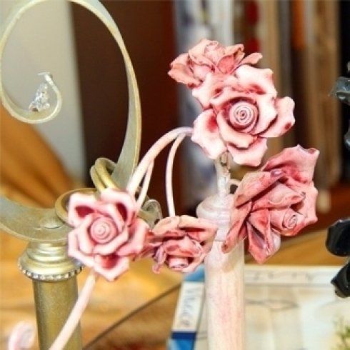 Decorazione per bastone porta tenda