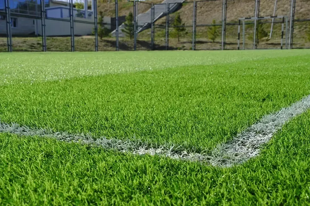 Henderson artificial turf - designed for outdoor sports, showcasing vibrant green grass ideal for athletic activities.