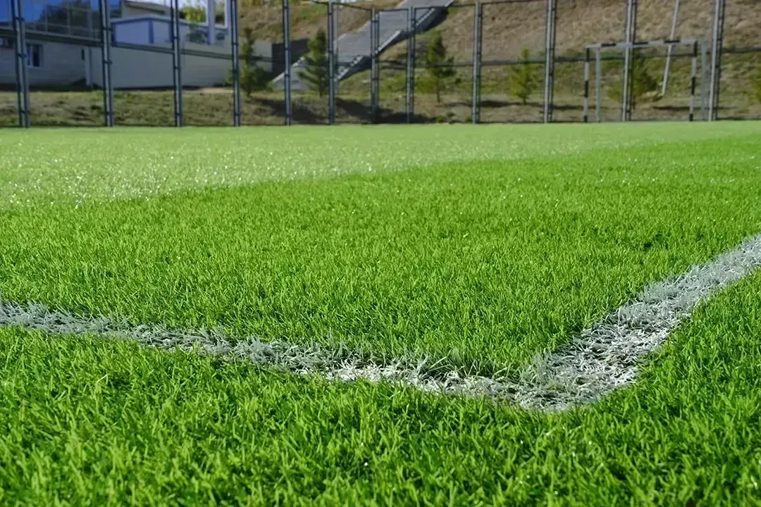 Henderson artificial turf - designed for outdoor sports, showcasing vibrant green grass ideal for athletic activities.

