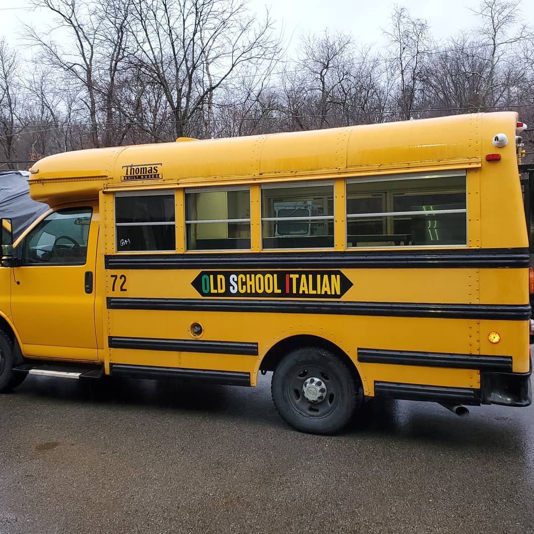 Yellow school bus converted to a food truck with 