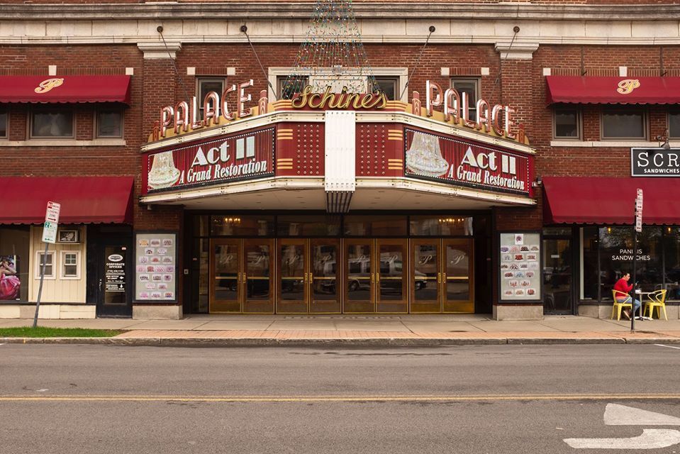 A building with a sign that says act ii on it