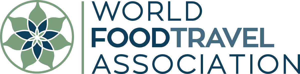 Logo for World Food Travel Association and World Culinary Culture Institute, with floral graphic.