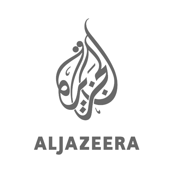 The aljazeera logo is gray and has arabic writing on it.