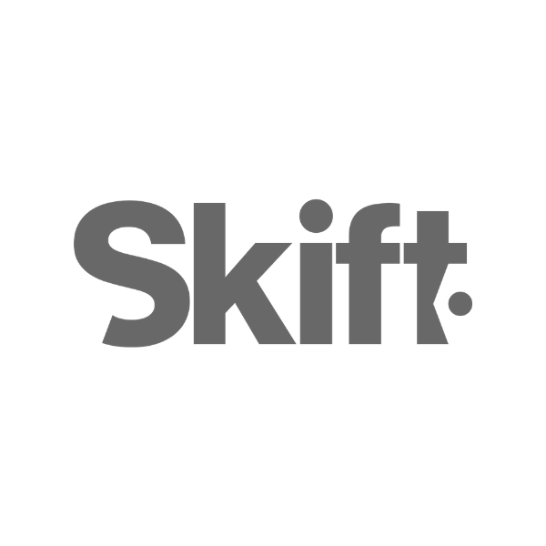 A black and white logo for skift on a white background.