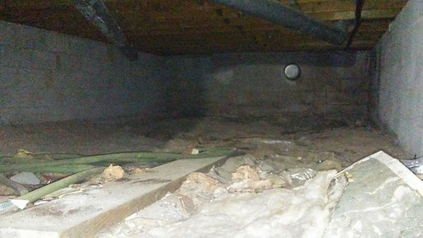 There is a hole in the ceiling of the attic.