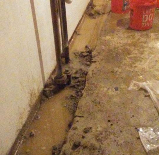 A red bucket with the word dirty on it