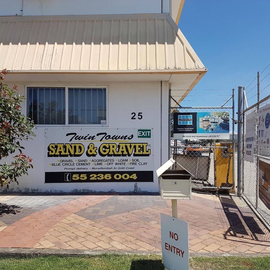 A Building With A Sign That Says Sand And Gravel — Twin Towns Sand & Gravel In Tweed Heads South, NSW