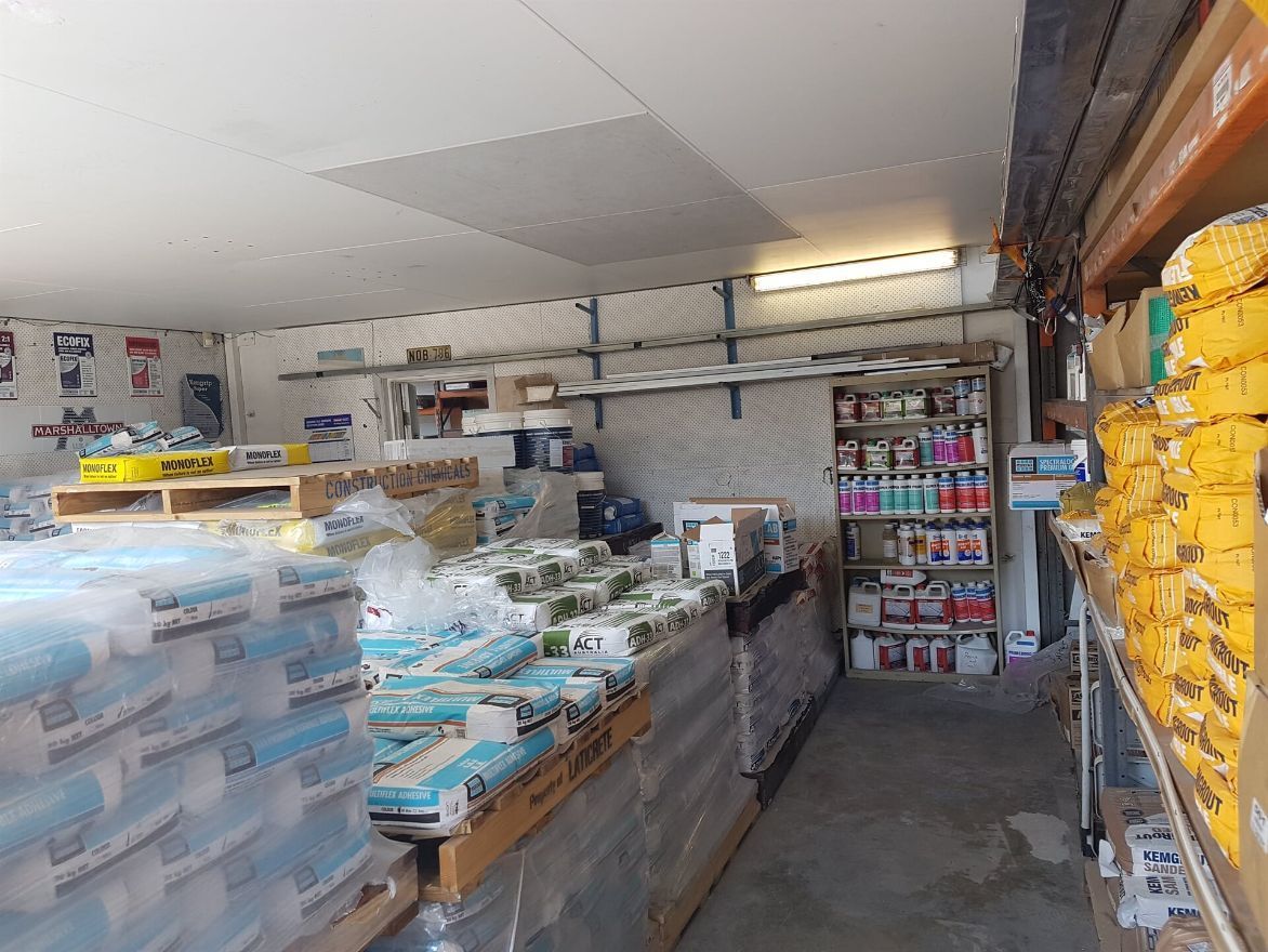 A Warehouse Filled With Lots Of Boxes And Shelves — Twin Towns Sand & Gravel In Byron Bay, NSW