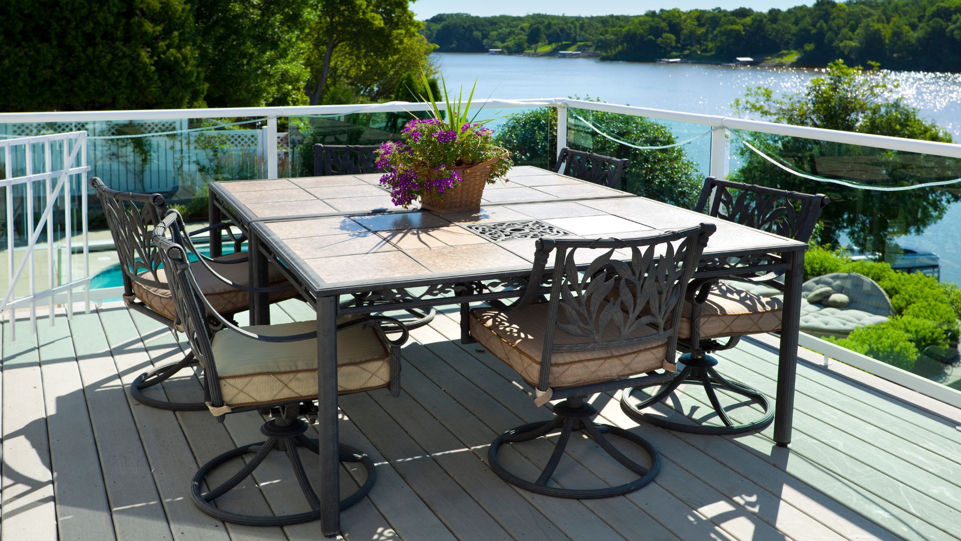 Lakeside patio with tiled table and chairs overlooking the water in Chula Vista, CA.