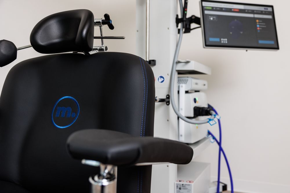 A black chair with a dell logo on it