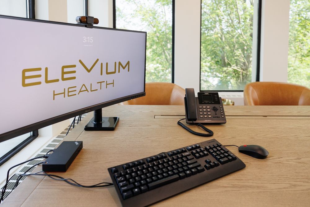 A desk setup with a monitor displaying