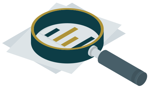 A magnifying glass is sitting on top of a piece of paper.