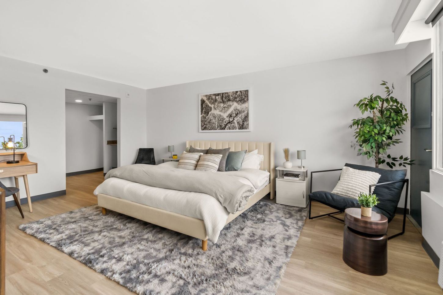 There is a large bed in the middle of the room.