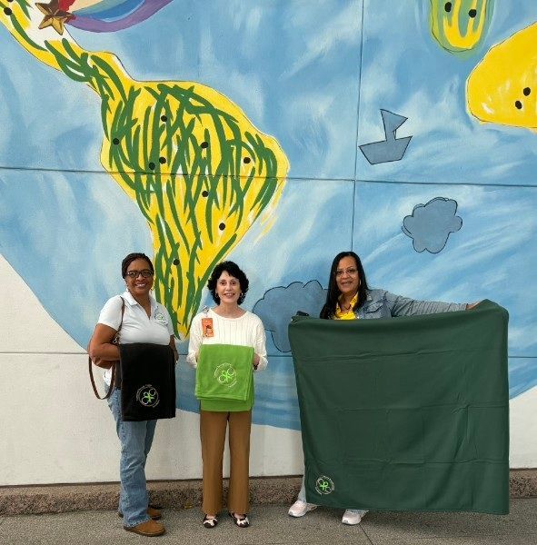 Renee Sanders, Charlease Hatchett donating  blankets Michelle Fritsch, LCSW from Texas Children's Cancer & Hematology Center