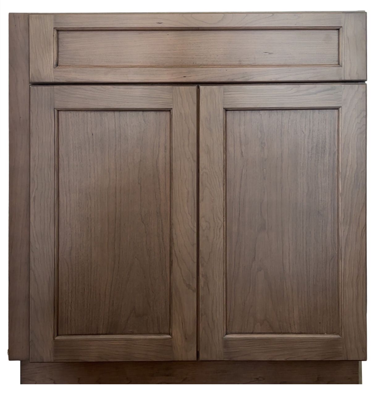 Angled view of light wood paneling on a corner wall, with recessed lighting in the ceiling.