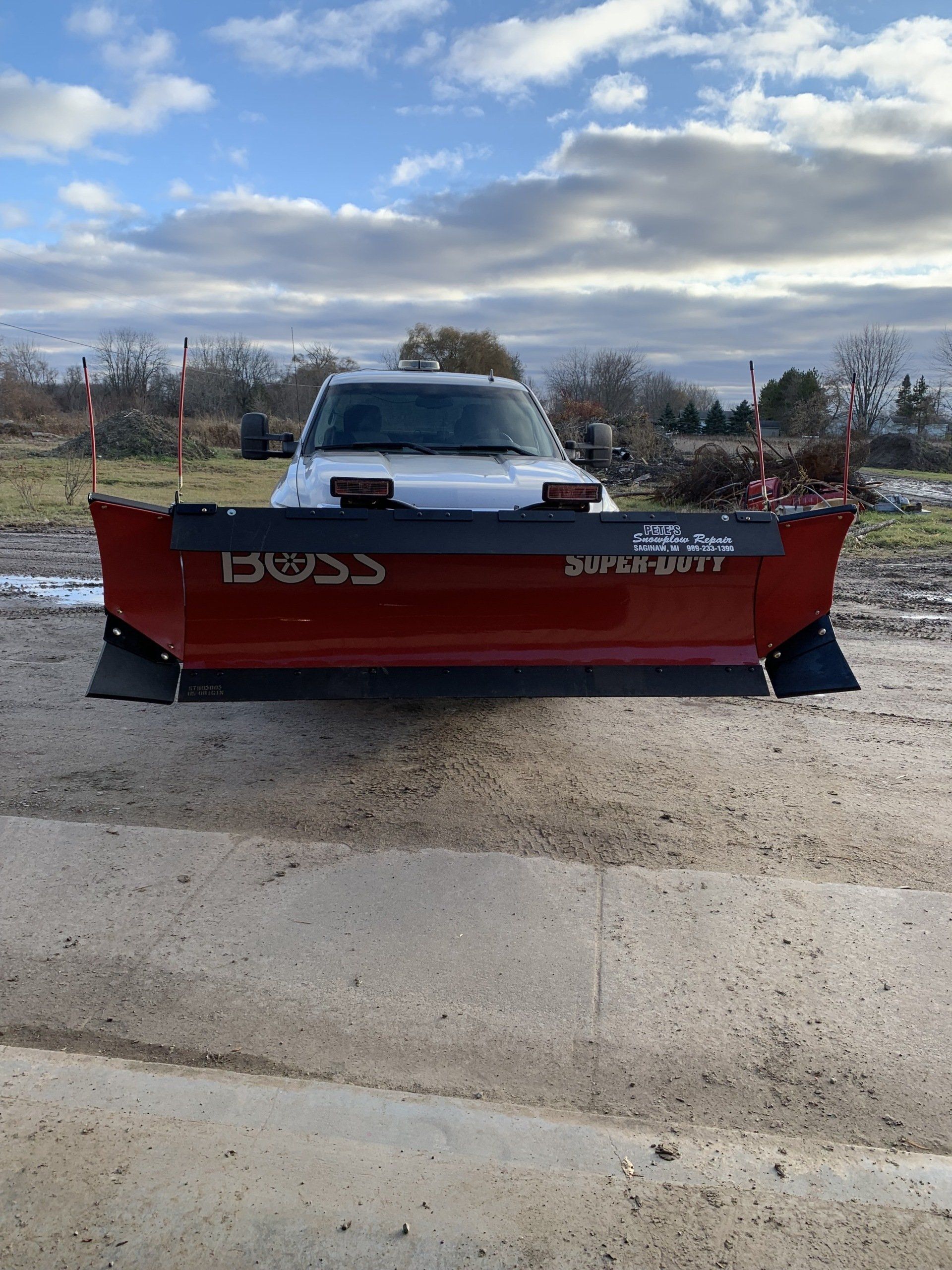 Snow Shovel on Car — Midland, MI — Maksymum Lawn and Landscaping