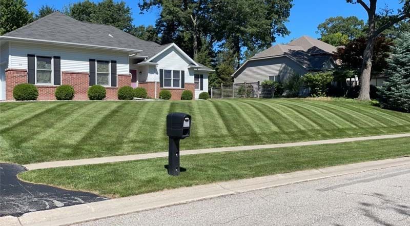 House Landscape — Midland, MI — Maksymum Lawn and Landscaping
