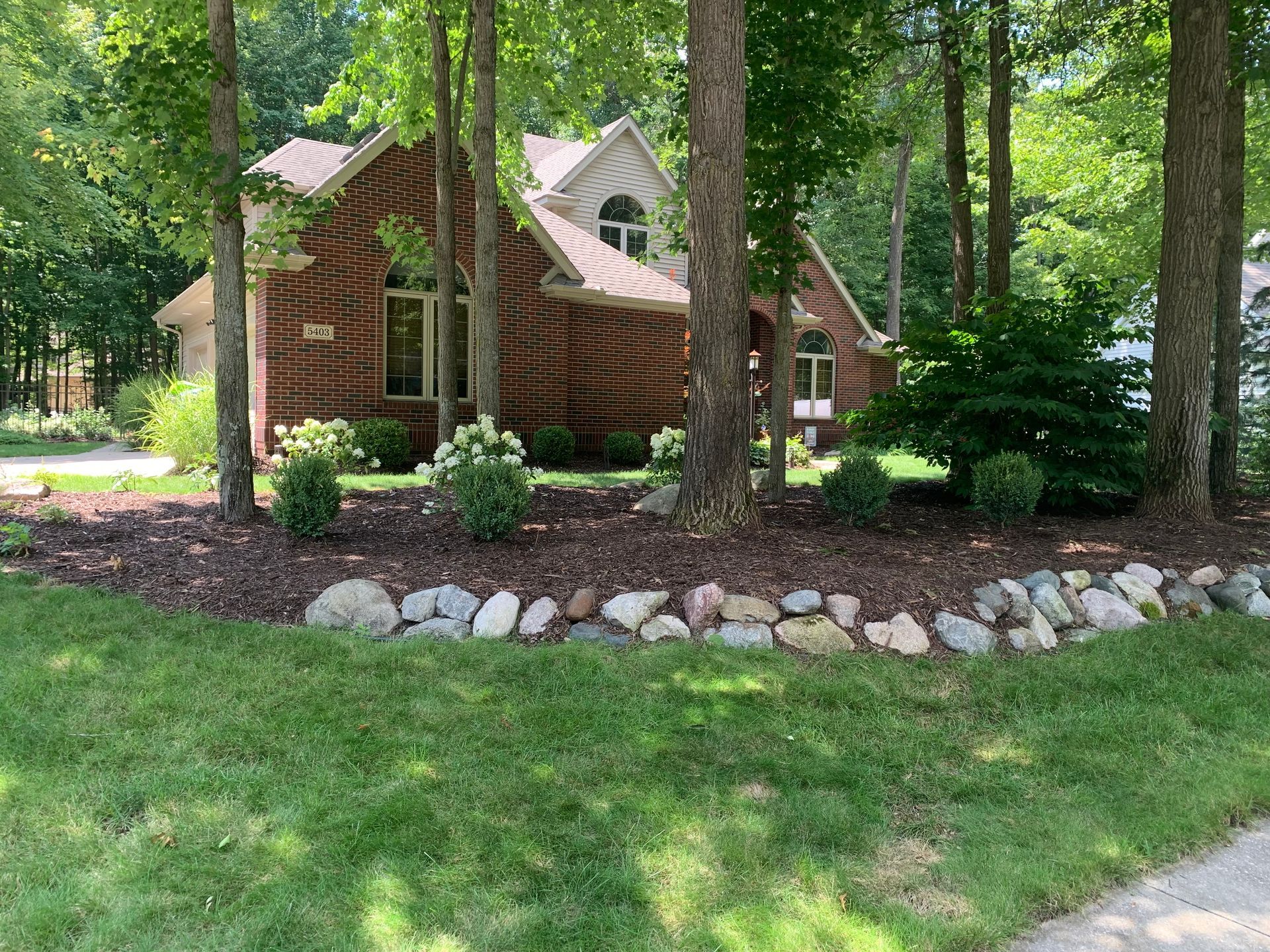 Tall Trees in Garden — Midland, MI — Maksymum Lawn and Landscaping