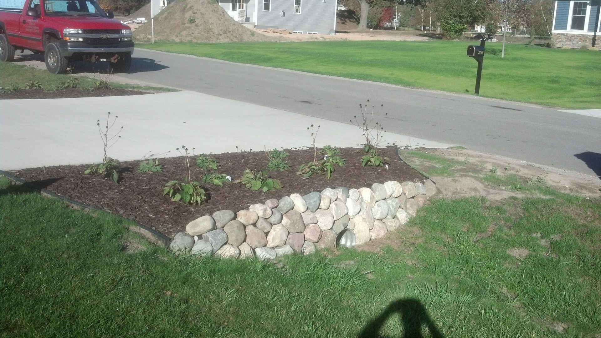 Mini Garden in Driveway — Midland, MI — Maksymum Lawn and Landscaping
