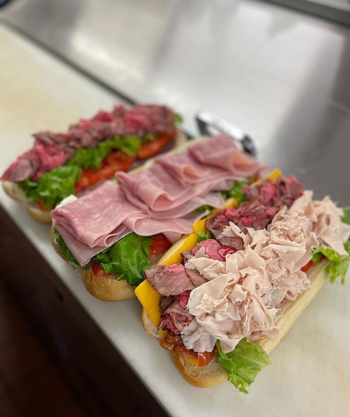 Three deli sandwiches