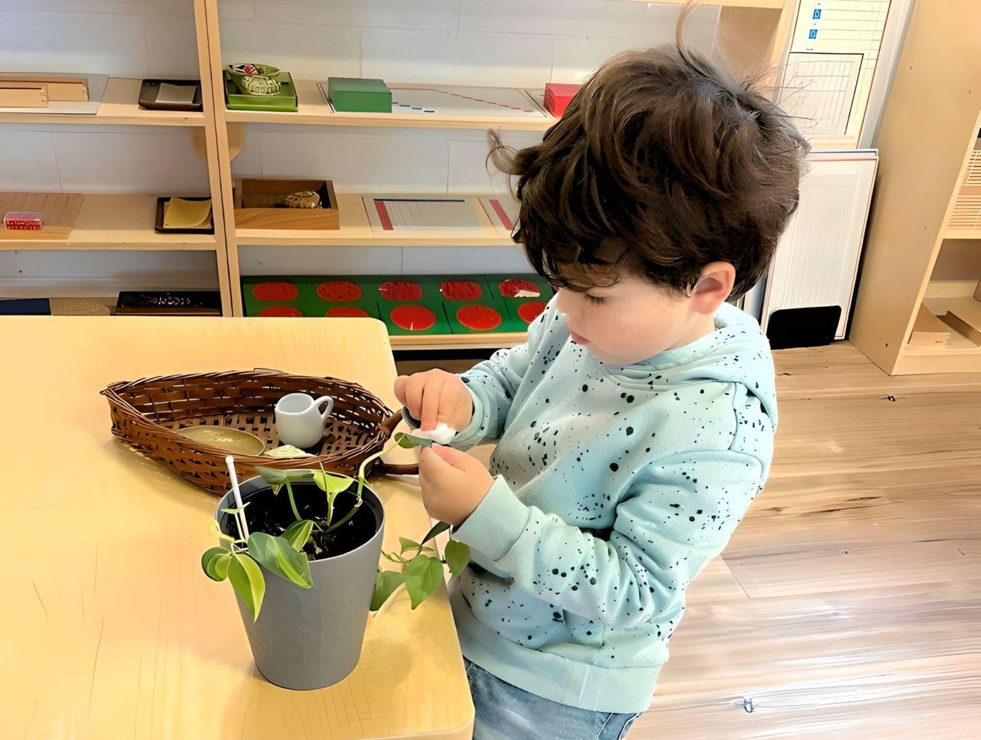 Montessori child working on practical life skills