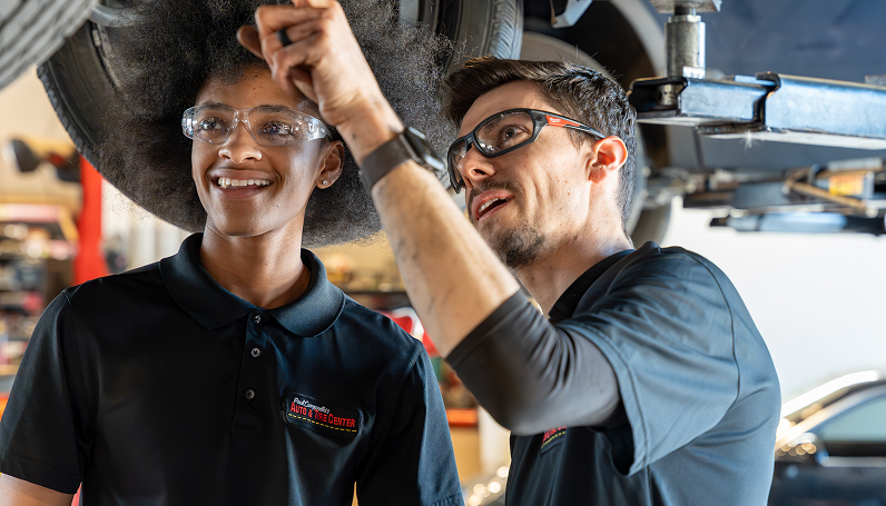 mechanics working on car | Paul Campanella's Auto Centers