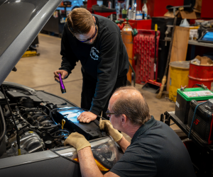 mechanics working on engine | Paul Campanella's Auto Centers